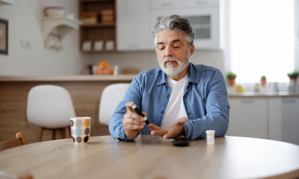 Healthcare provider reviewing blood sugar monitoring results and diabetes management plan with a patient